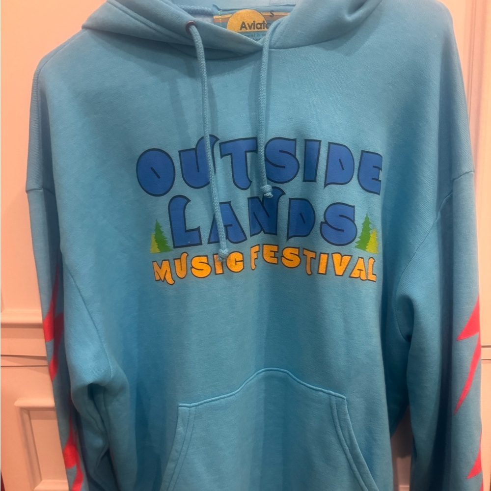 Aviator Nation Outside Lands 2024 Music Festival unisex hoodie in neon blue.